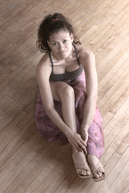 Seated Beauty Model on Wood floor