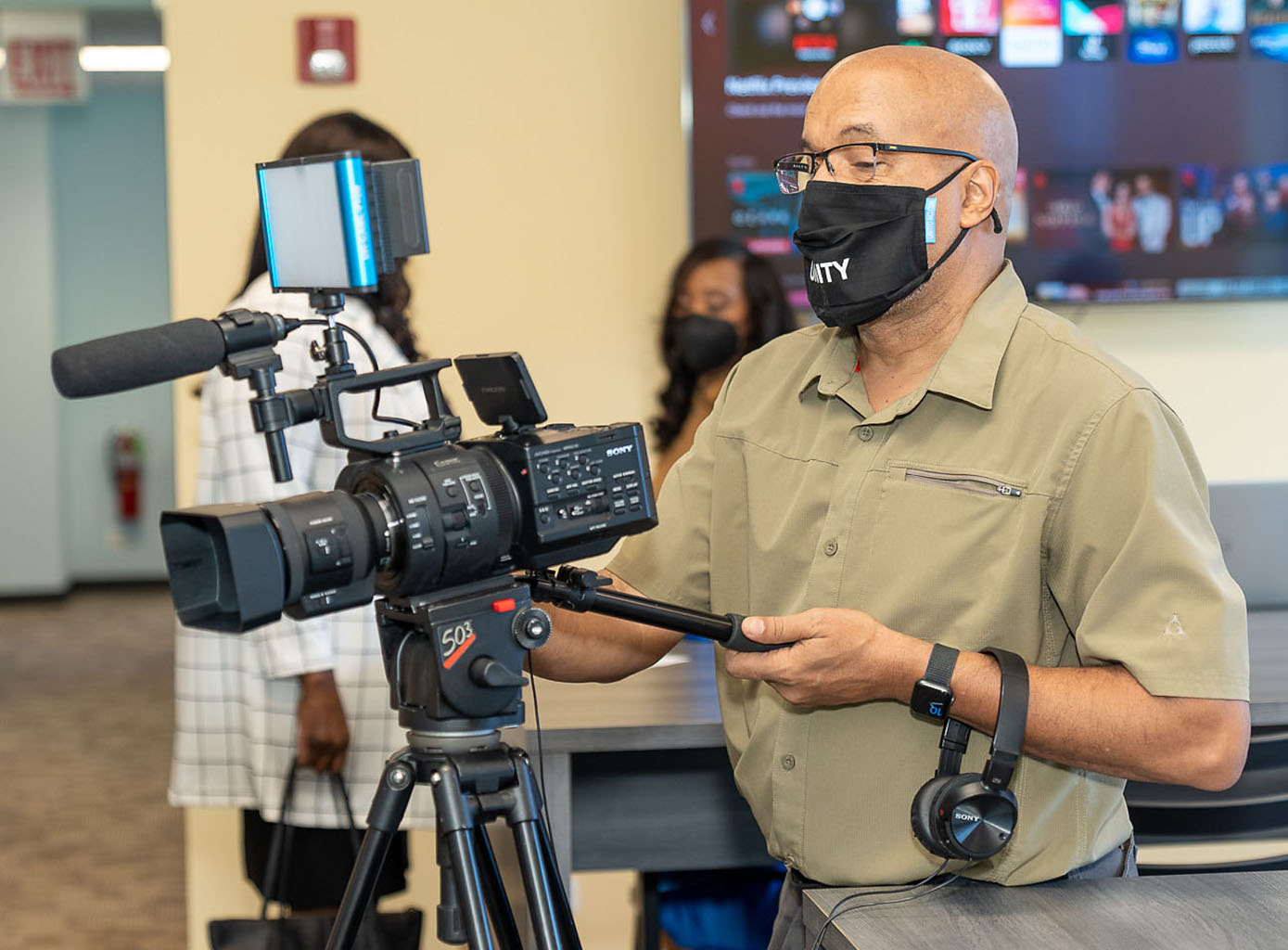 Victor Powell at Work with Video Camera